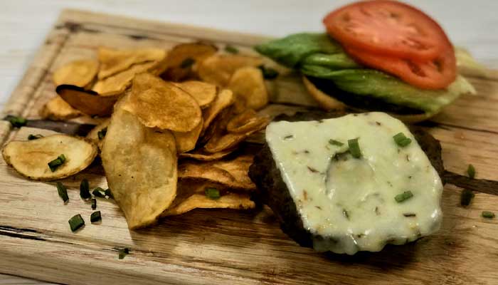 The Lodge of Spring Grove restaurant and bar in Illinois serves the best smash cheeseburgers topped with pepperjack cheese